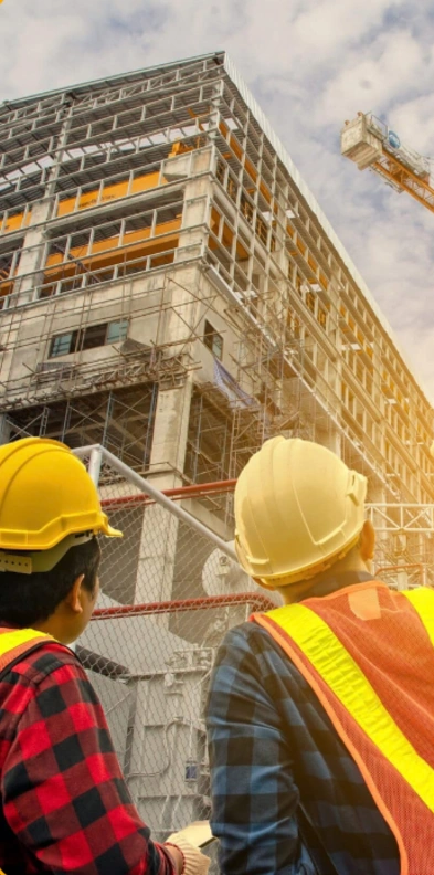 Construction professionals reviewing a building project, from the Cogma company profile